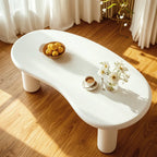 Petite table basse blanche moderne de forme irrégulière, facile à assembler