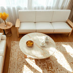 Table basse ronde moderne en bois blanc pour salon