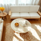 Table basse ronde moderne en bois blanc pour salon