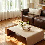 Table basse moderne incurvée en bois brun avec double piétement