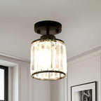 Plafonnier semi-encastré élégant en cristal clair, de forme cylindrique.