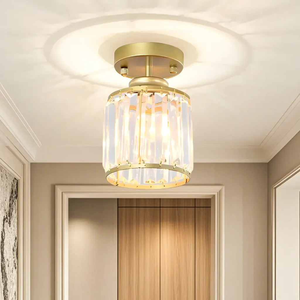 Plafonnier semi-encastré élégant en cristal clair, de forme cylindrique.