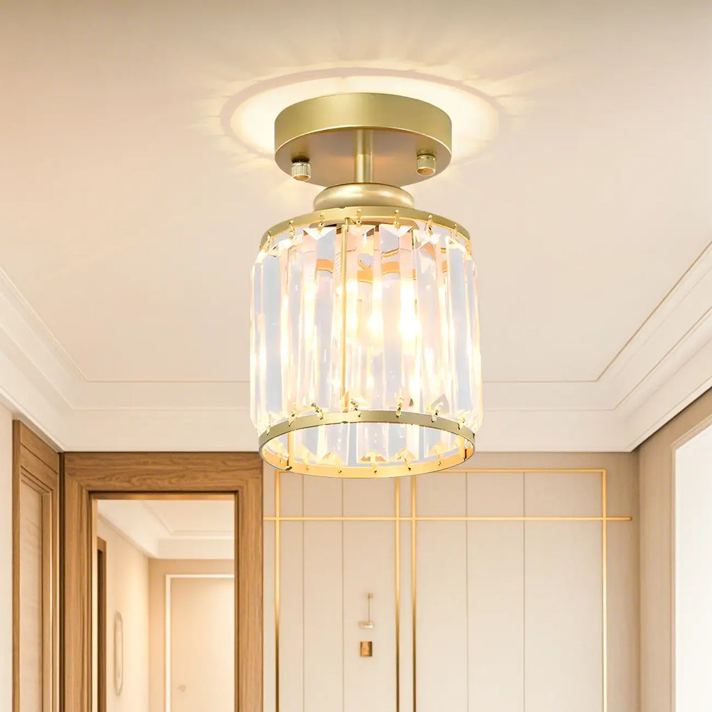 Plafonnier semi-encastré élégant en cristal clair, de forme cylindrique.