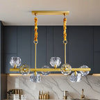 Grande suspension linéaire en métal et cristal doré pour cuisine