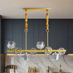 Grande suspension linéaire en métal et cristal doré pour cuisine