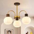 Lustre en verre blanc avec arche dorée, accents de bois et sphère en verre blanc