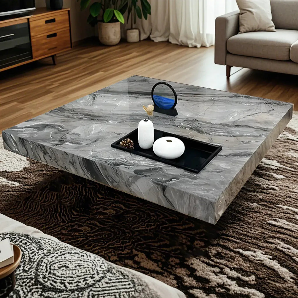 Table basse carrée grise moderne avec piètement en acier inoxydable