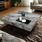 Table basse carrée grise moderne avec piètement en acier inoxydable