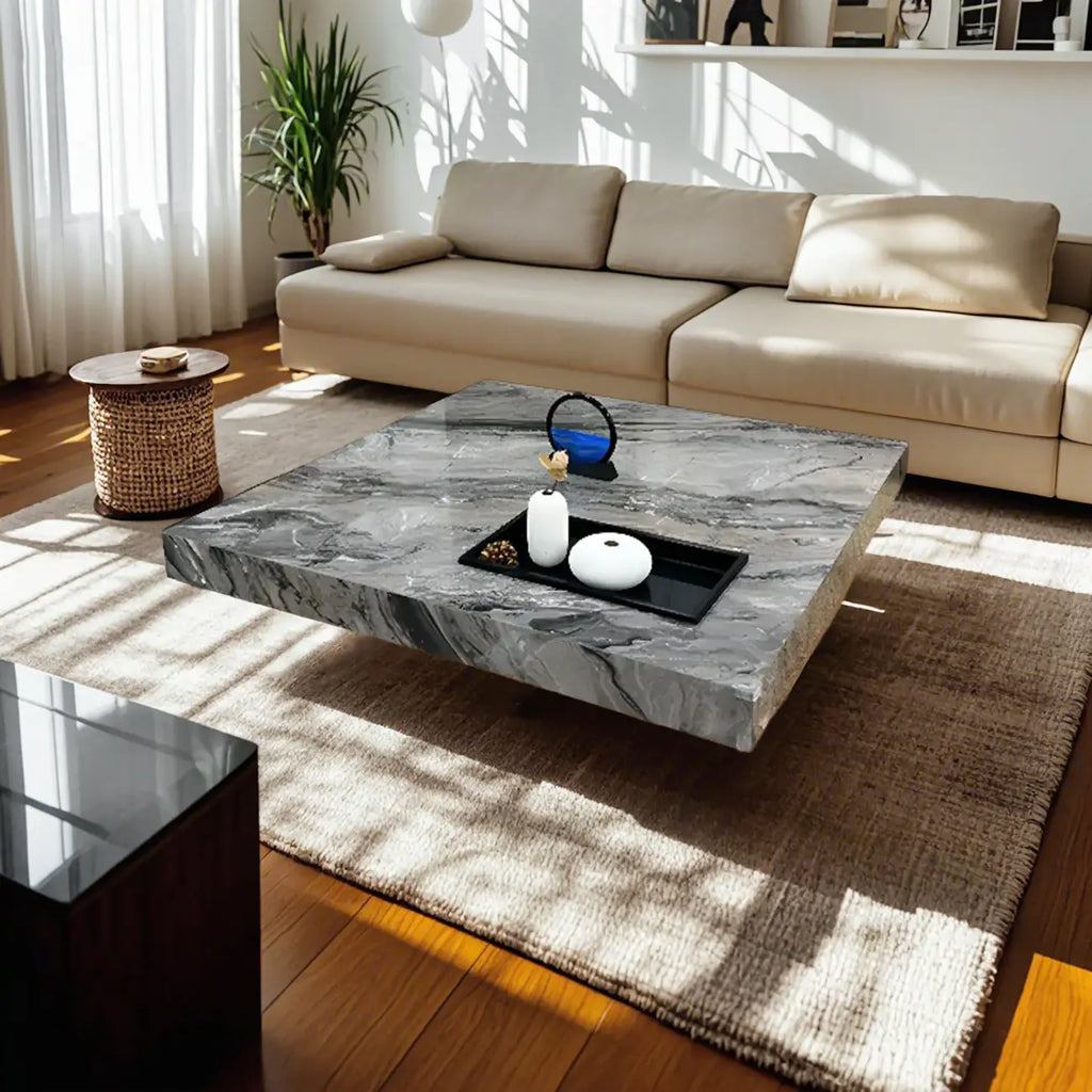 Table basse carrée grise moderne avec piètement en acier inoxydable
