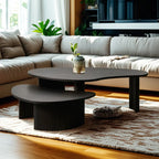 Table basse contemporaine en bois noir de forme unique