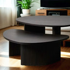 Table basse contemporaine en bois noir de forme unique