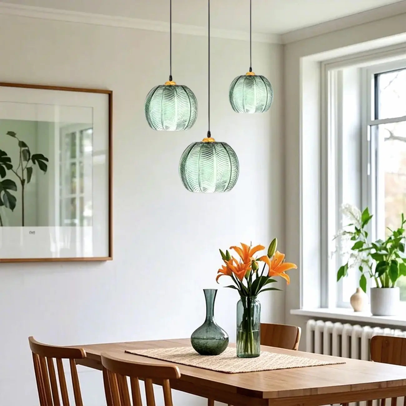 Suspension globe moderne en verre vert inspirée des feuilles