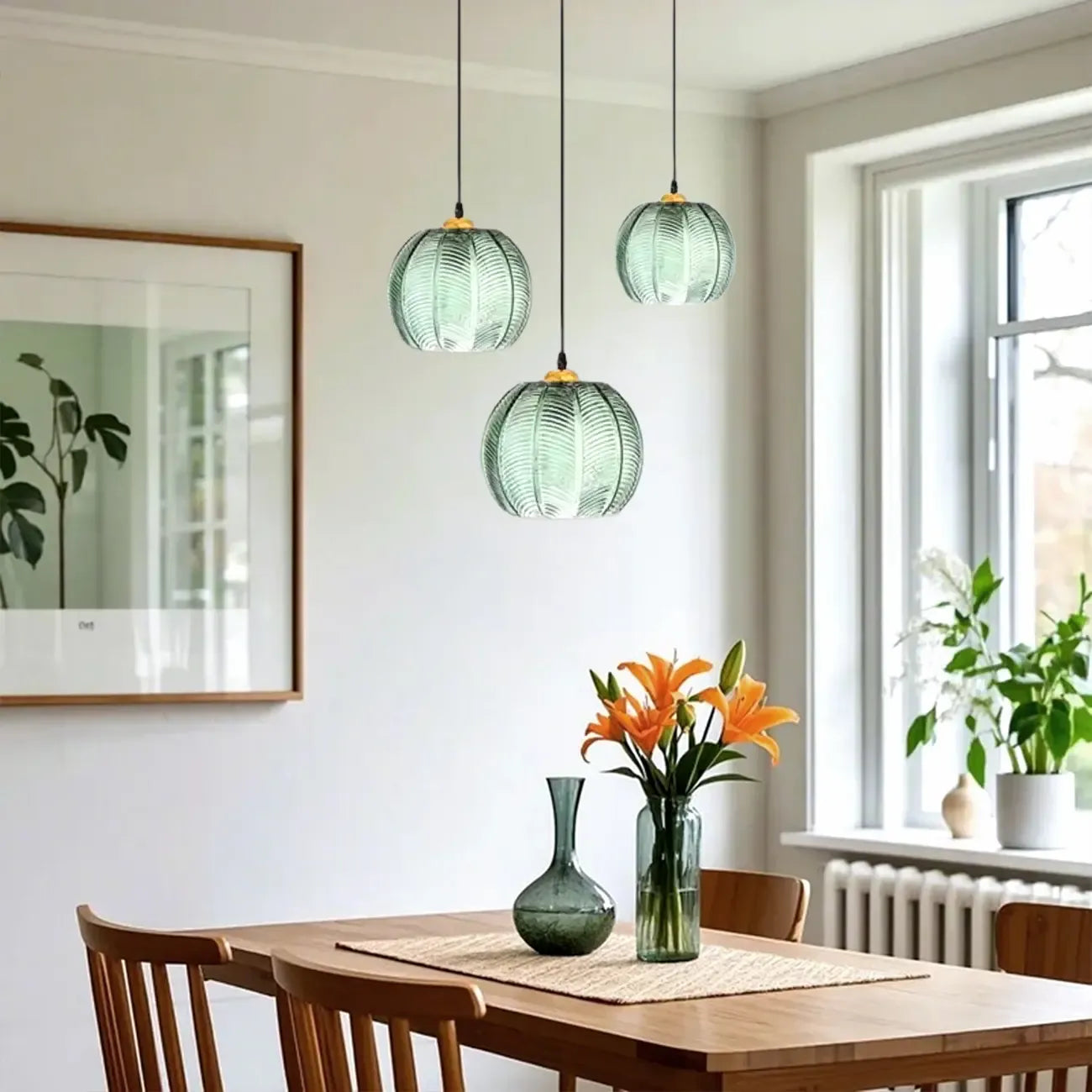 Suspension globe moderne en verre vert inspirée des feuilles