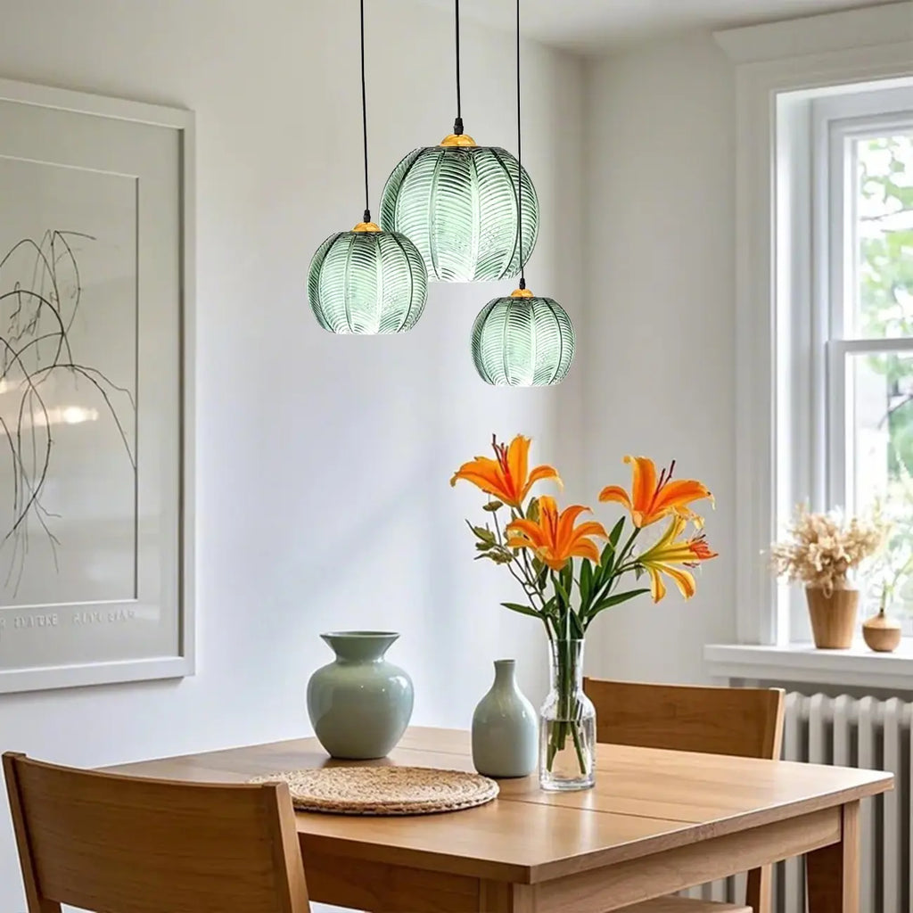 Suspension globe moderne en verre vert inspirée des feuilles