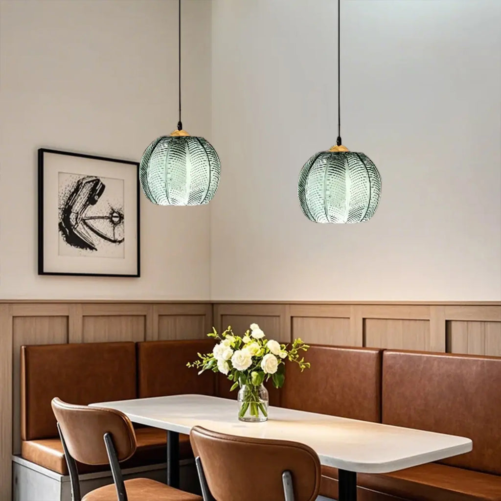 Suspension globe moderne en verre vert inspirée des feuilles