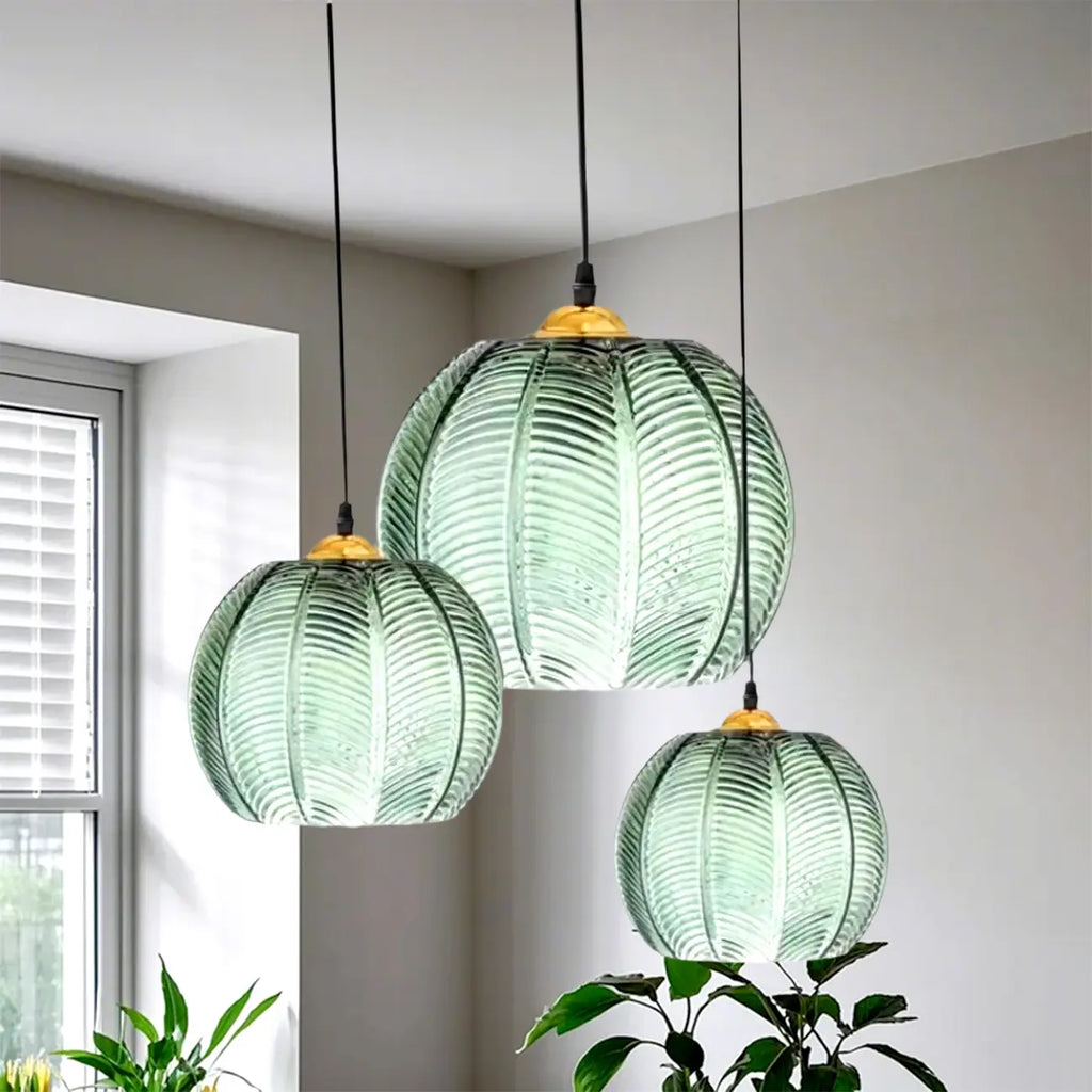 Suspension globe moderne en verre vert inspirée des feuilles