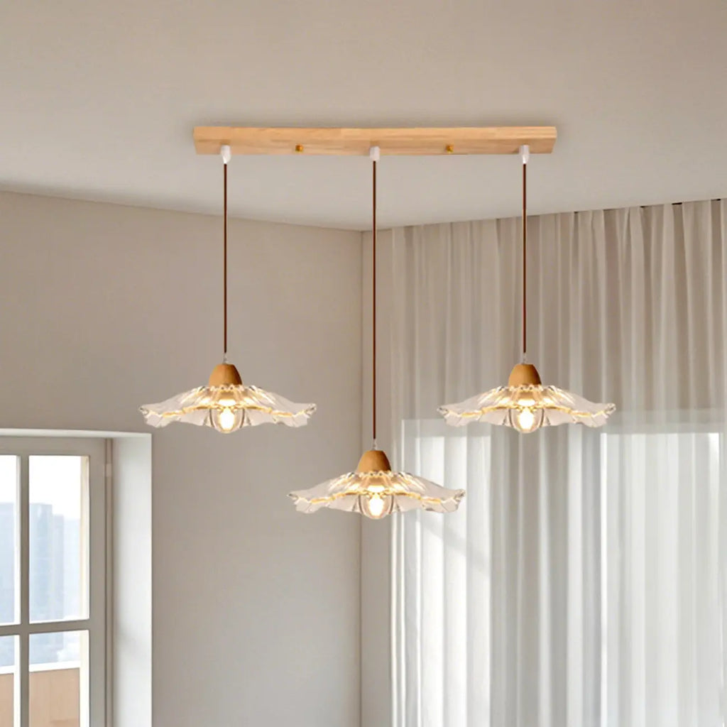 Suspension florale élégante en verre transparent à 3 lumières