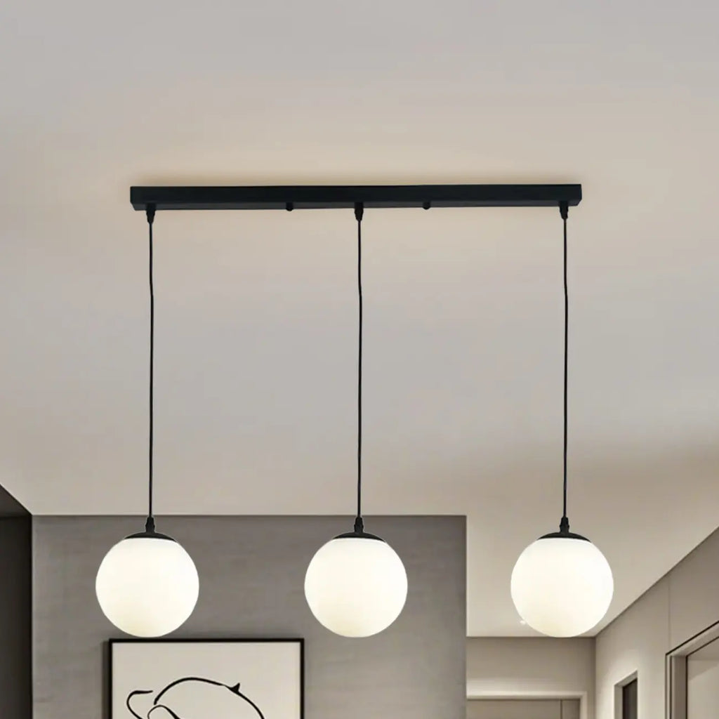 Lampadario moderno a sospensione con 3 globi in vetro