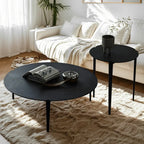 Table basse ronde en bois noir de style scandinave chic