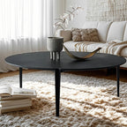 Table basse ronde en bois noir de style scandinave chic