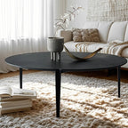 Table basse ronde en bois noir de style scandinave chic