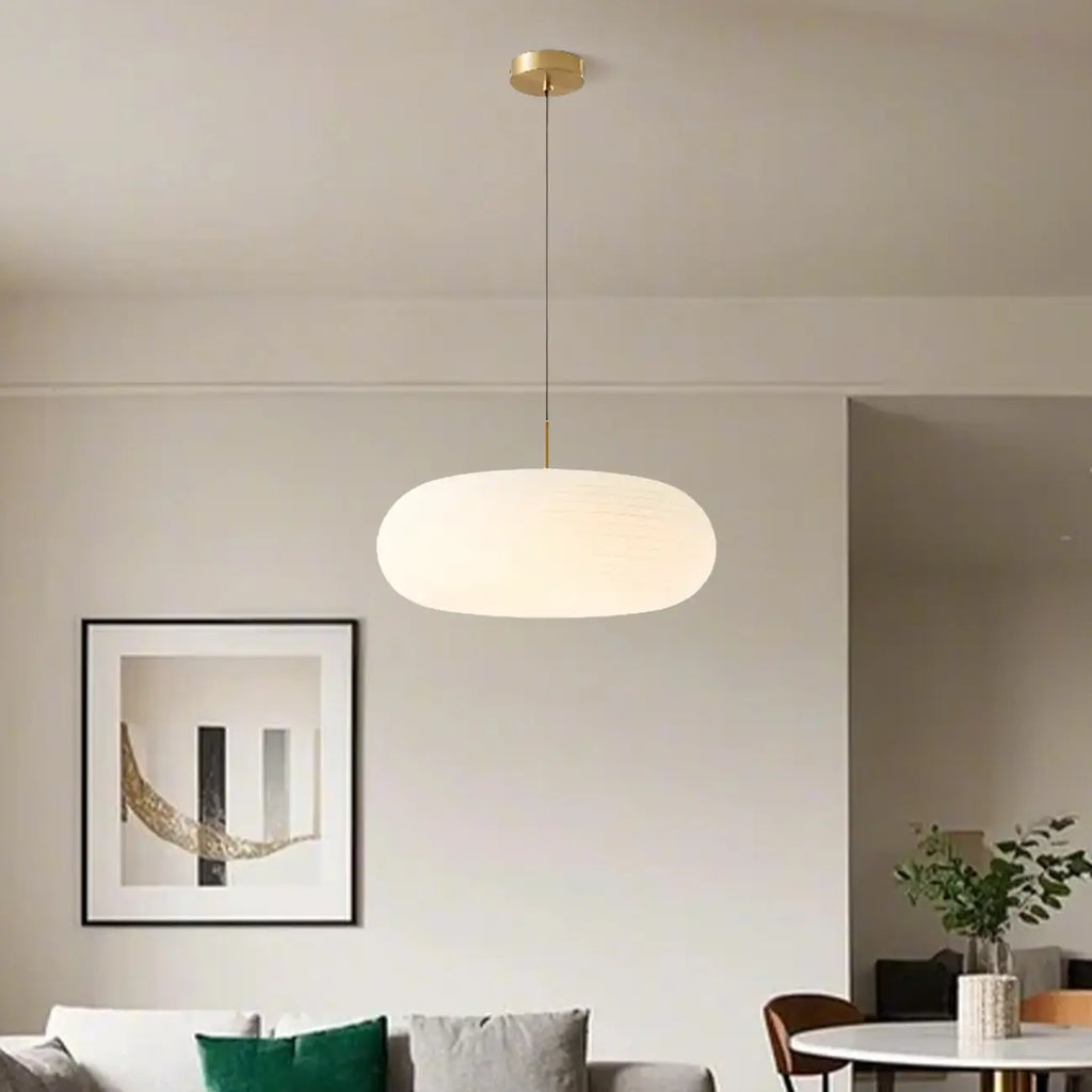 Suspension LED en forme de galet en acrylique crème pour salon