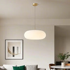 Suspension LED en forme de galet en acrylique crème pour salon