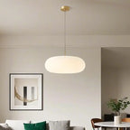Suspension LED en forme de galet en acrylique crème pour salon