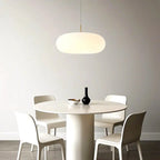 Suspension LED en forme de galet en acrylique crème pour salon