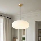 Suspension LED en forme de galet en acrylique crème pour salon