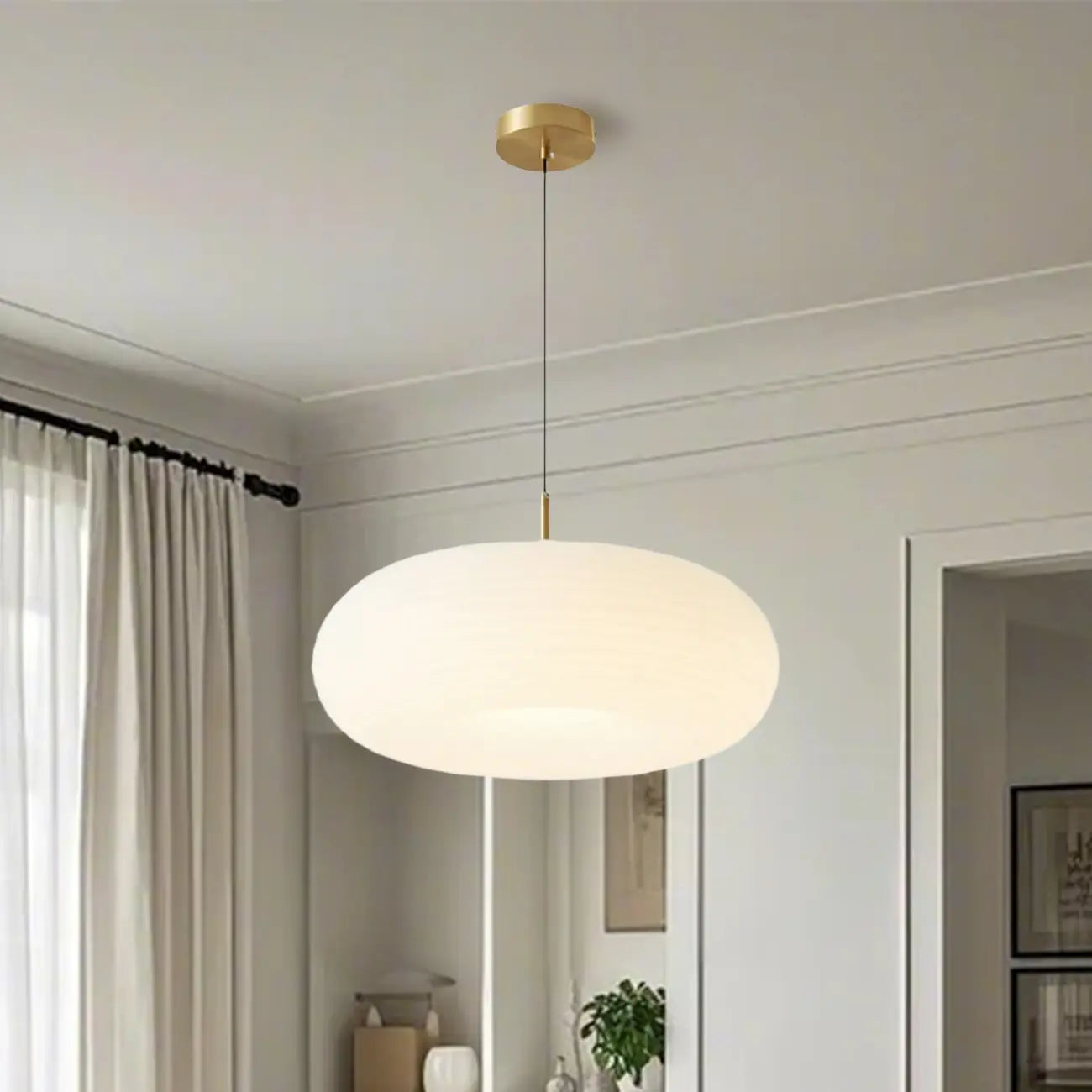 Suspension LED en forme de galet en acrylique crème pour salon