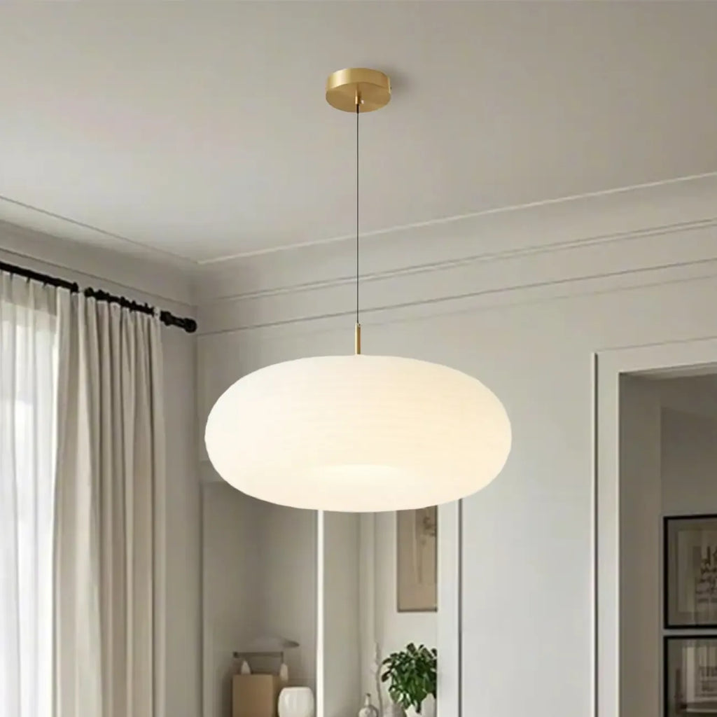 Suspension LED en forme de galet en acrylique crème pour salon