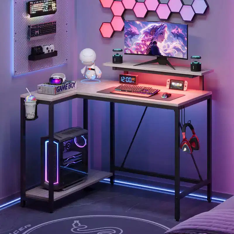 Bureau de jeu en L réversible Pinmoco 42 avec support d'écran, lumières LED, crochet pour casque et étagères de rangement, bureau à domicile