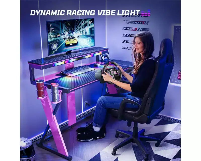 Bestier Bureau Gamer en Forme de L de 105,6 cm/144,8 cm avec Support Moniteur et Prise de Courant, Bureau d'Angle d'Ordinateur LED avec Porte-Gobelet et Support Manette
