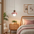Suspension LED rose poudré avec motif floral en argile pour chevet