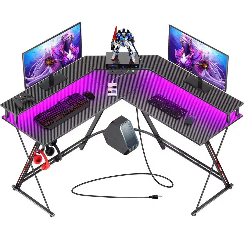 Greenstell Bureau en L de 128 cm – Surface en fibre de carbone avec lumière LED et prises de courant, table de gamer avec support d'écran et crochet pour casque
