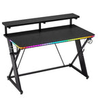 RSPGAME Basic 43 Bureau de jeu lumineux synchronisé avec la musique, support de moniteur ergonomique en forme de X, table de joueur, bureau d'ordinateur avec porte-gobelet et support de casque