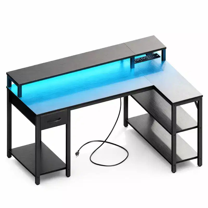 Bureau gaming en L Bestier avec lumières LED RVB, station de chargement USB, prise électrique, support d'écran et étagères de rangement