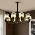 Lustre moderne en forme de cylindre de roue en métal noir et cristal pour salon ou hall d'entrée