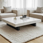 Table basse carrée moderne en pierre frittée beige avec piètement traîneau