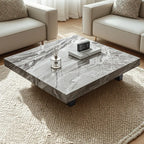 Table basse carrée moderne en pierre frittée beige avec piètement traîneau