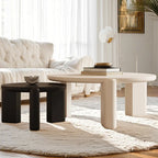 Table basse ronde en bois à trois pieds, noire et blanche