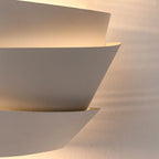 Applique murale minimaliste blanche à plusieurs niveaux pour l'éclairage de la chambre