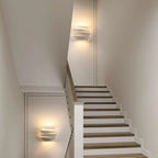 Applique murale minimaliste blanche à plusieurs niveaux pour l'éclairage de la chambre