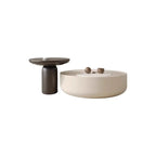 Table basse ronde moderne en pierre blanche avec rangement