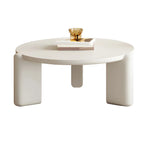 Table basse ronde en bois à trois pieds, noire et blanche