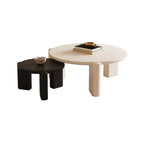 Table basse ronde en bois à trois pieds, noire et blanche