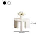 Table basse ronde en bois à trois pieds, noire et blanche
