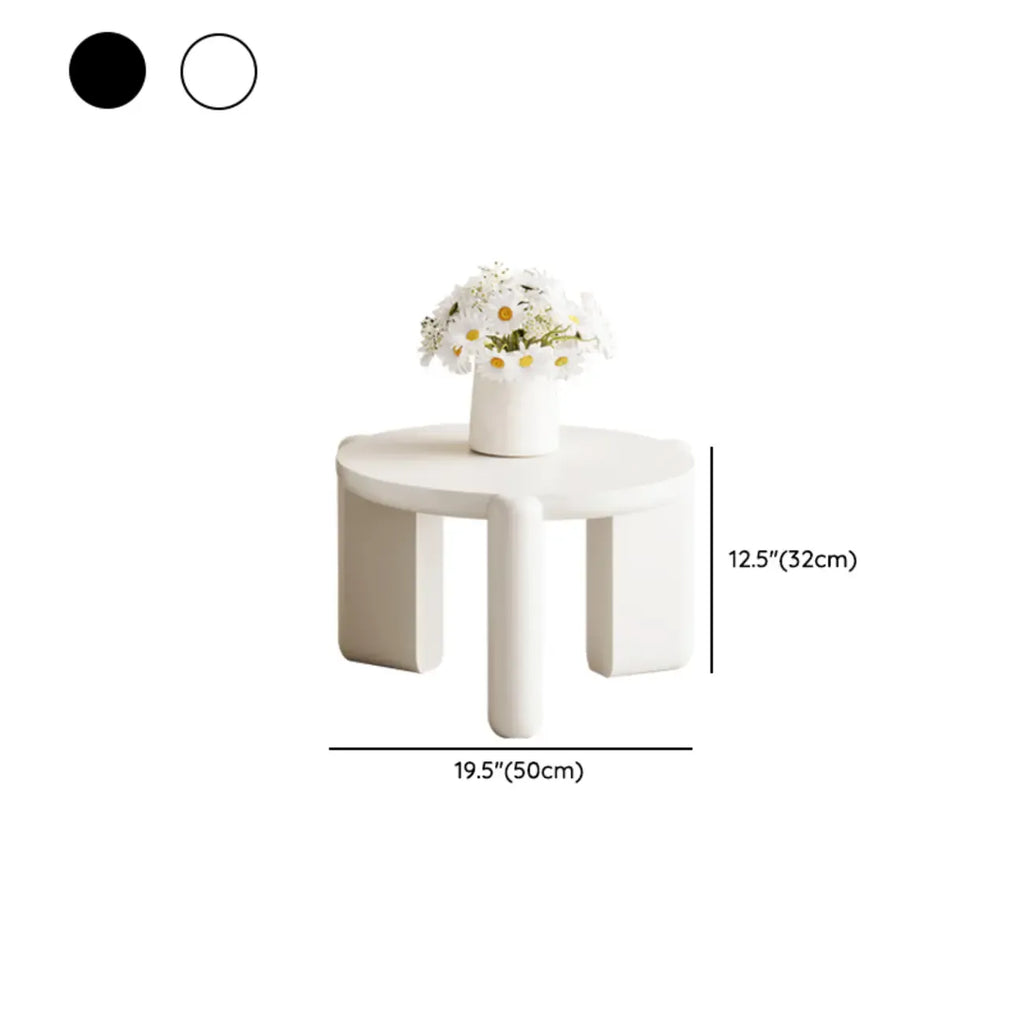 Table basse ronde en bois à trois pieds, noire et blanche