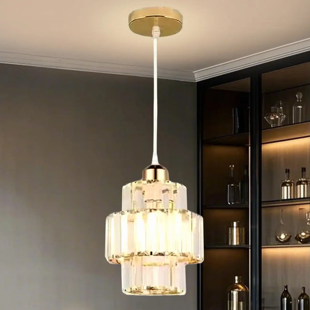 Elegante lampada a sospensione cilindrica in cristallo trasparente per sala da pranzo